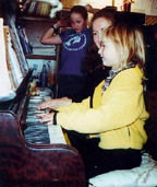 child playing piano
